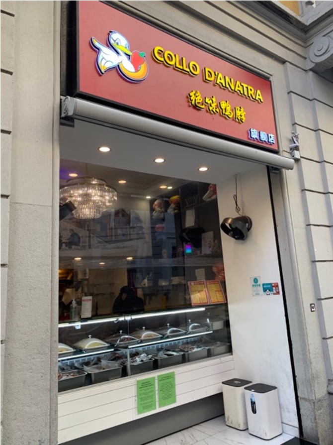 Insegna di uno street food cinese con un'anatra